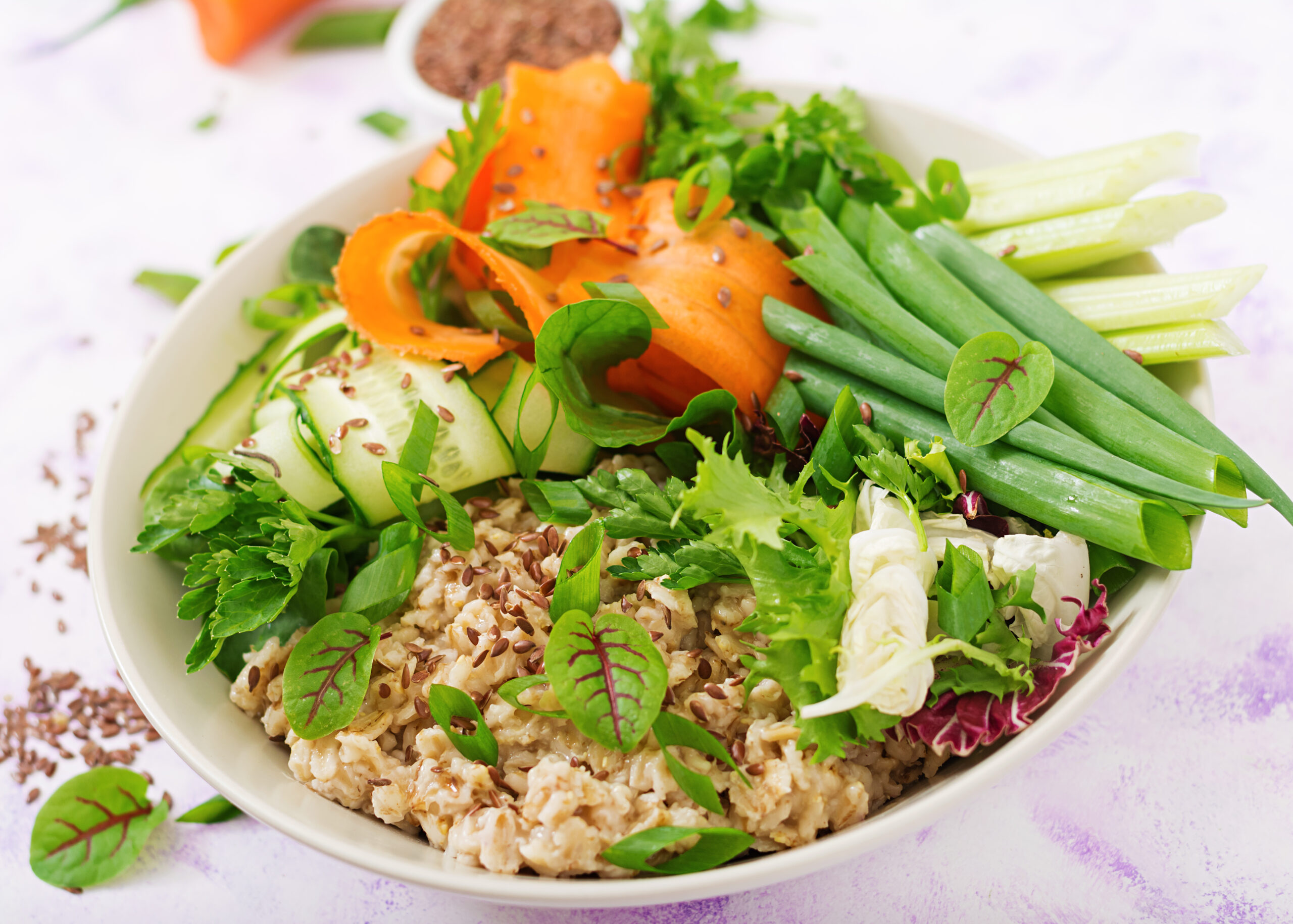 diet-menu-healthy-lifestyle-oat-porridge-fresh-vegetables-with-celery-spinach-cucumber-carrot-onion-plate